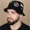 NEW ERA All Over Patch Bucket Black -NEW ERA Winkel all over patch bucket black